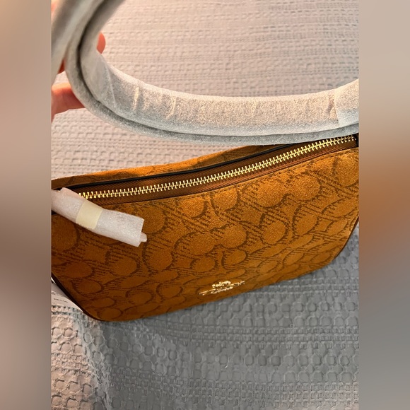 Coach Kailey Shoulder Bag
In Signature Suede - Picture 13 of 14